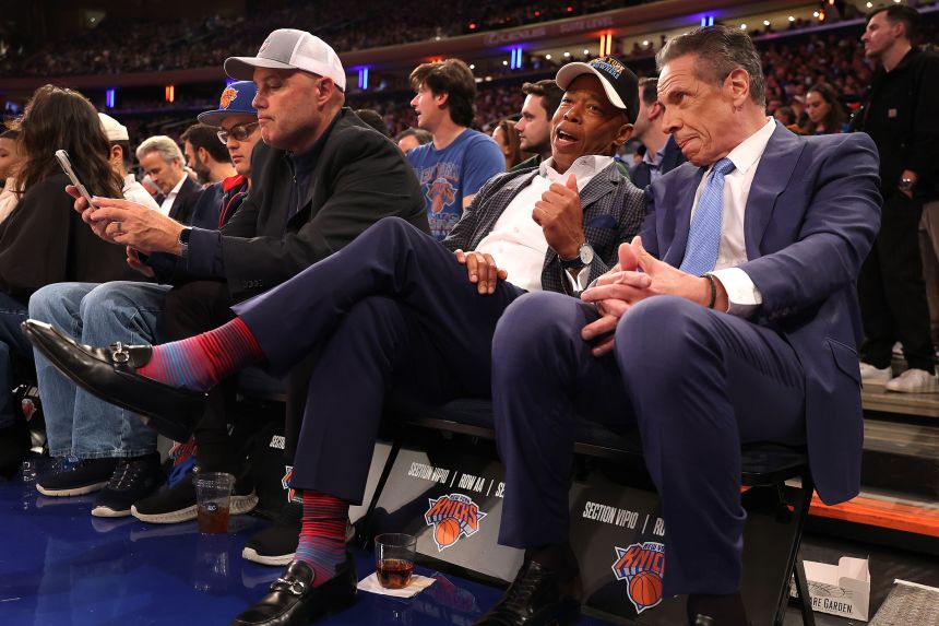 New York Mayor Eric Adams sits with independent candidate for the mayorship and former New York Gov. Andrew Cuomo at a New York Knicks game on Wednesday, October 22, 2025, after Cuomo participated in the second debate for the upcoming mayoral election.