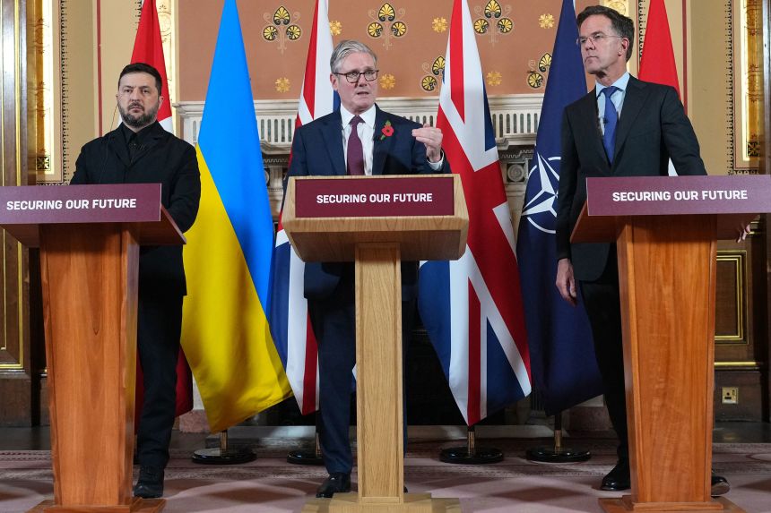 Britain's Prime Minister Keir Starmer, center, Ukraine's President Volodymyr Zelensky, left, and NATO Secretary-General Mark Rutte attend a media conference after a meeting of the 'Coalition of the Willing' international partners on Ukraine in London on October 24.