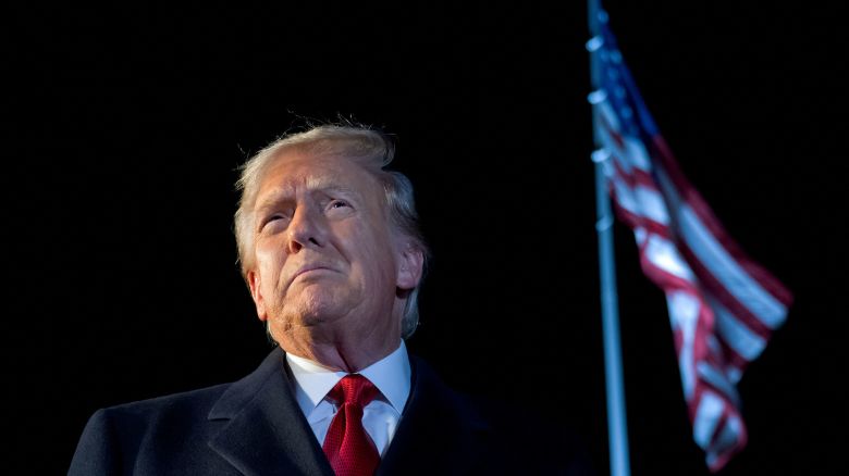 President Donald Trump speaks to the media as he walks to Marine One prior to departure from the South Lawn of the White House on October 24.