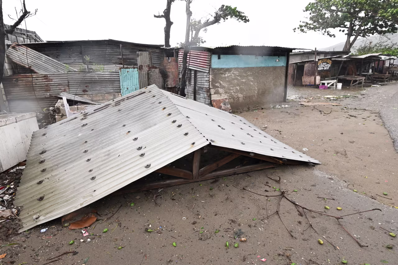 A roof lies on the ground after being torn off of a building in St. Catherine, Jamaica, on October 28.