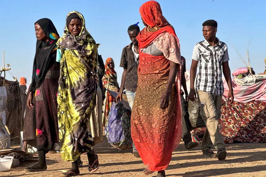 Displaced Sudanese who fled El Fasher arrive in the town of Tawira.