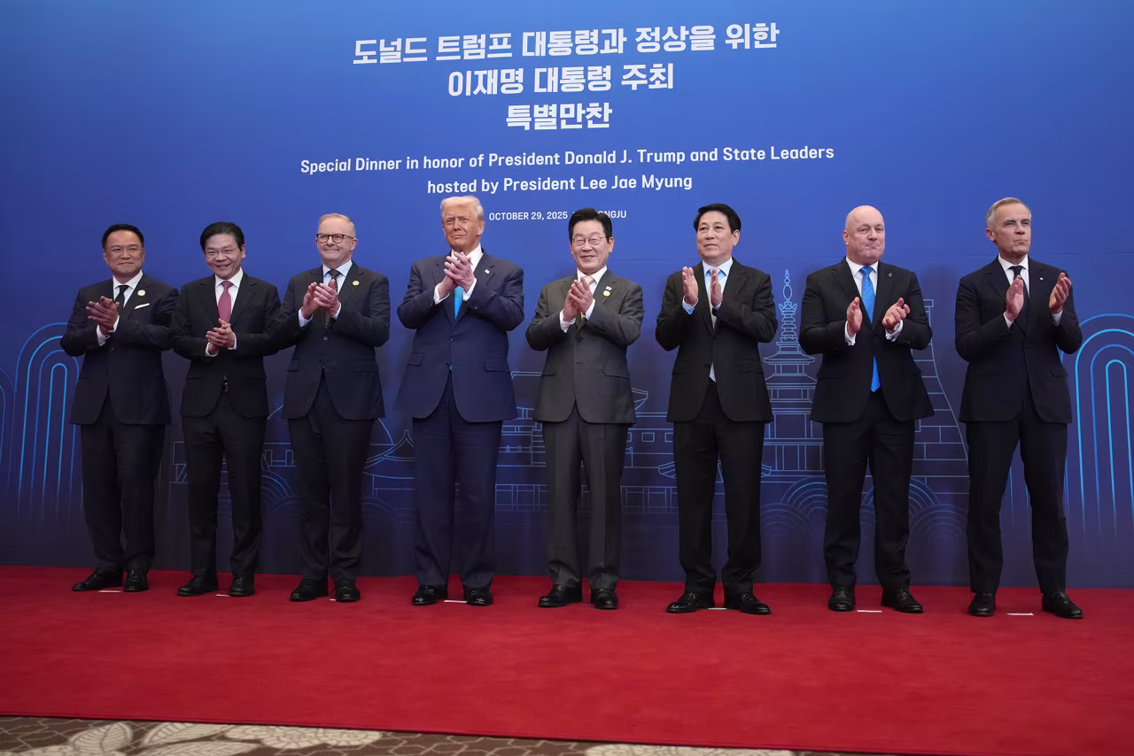 Leaders pose for a group photo ahead of a dinner in honor of the US president at the Hilton Gyeongju on Wednesday.