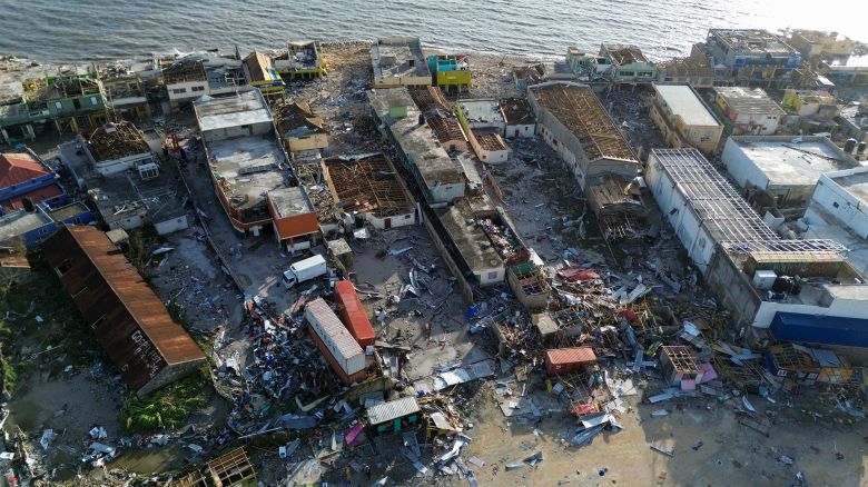 An aerial view shows destroyed buildings following the passage of Hurricane Melissa, in Black River, St. Elizabeth, Jamaica on October 29, 2025. Hurricane Melissa bore down on the Bahamas October 29 after cutting a path of destruction through the Caribbean, leaving 30 people dead or missing in Haiti and parts of Jamaica and Cuba in ruins. 
Somewhat weakened but still threatening, Melissa will bring damaging winds and flooding rains to the Bahamas Wednesday before moving on to Bermuda late Thursday, according to the US National Hurricane Center (NHC). (Photo by Ricardo Makyn / AFP) (Photo by RICARDO MAKYN/AFP via Getty Images)