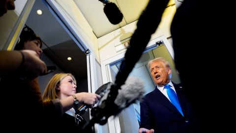 US President Donald Trump speaks to journalists aboard Air Force One en route to South Korea on October 29, 2025.