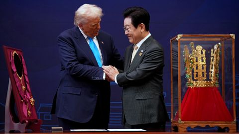 GYEONGJU, SOUTH KOREA - OCTOBER 29: U.S. President Donald Trump reacts as he is presented with the Grand Order of Mugunghwa and the Silla gold crown by South Korean President Lee Jae Myung at the Gyeongju National Museum on October 29, 2025 in Gyeongju, South Korea. Trump is in South Korea for the APEC meetings, following an appearance at the ASEAN summit in Malaysia, and a trip to Japan, where he called on Japanese Emperor Naruhito and new Prime Minister Sanae Takaichi. (Photo by Andrew Harnik/Getty Images)