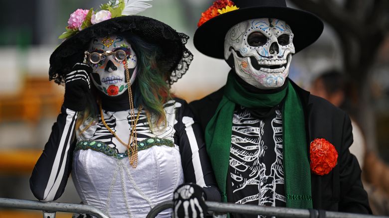 Revellers attend the Grand Parade commemorating the Day of the Dead in Mexico City, on November 1, 2025. (Photo by CARL DE SOUZA / AFP) (Photo by CARL DE SOUZA/AFP via Getty Images)          