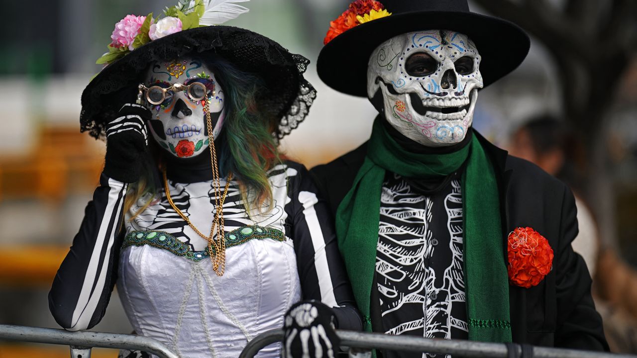 Revellers attend the Grand Parade commemorating the Day of the Dead in Mexico City, on November 1, 2025. (Photo by CARL DE SOUZA / AFP) (Photo by CARL DE SOUZA/AFP via Getty Images)          
