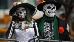 Revellers attend the Grand Parade commemorating the Day of the Dead in Mexico City, on November 1, 2025. (Photo by CARL DE SOUZA / AFP) (Photo by CARL DE SOUZA/AFP via Getty Images)          