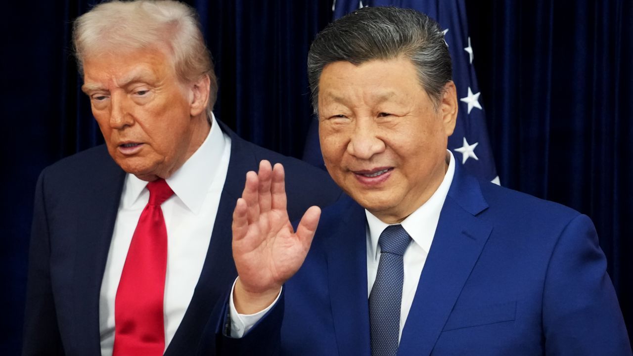 BUSAN, SOUTH KOREA - OCTOBER 30: U.S. President Donald Trump and Chinese President Xi Jinping react after posing for photos ahead of a bilateral meeting at Gimhae Air Base on October 30, 2025 in Busan, South Korea. Trump is meeting Xi for the first time since taking office for his second term, following months of growing tension between both countries. (Photo by Andrew Harnik/Getty Images)