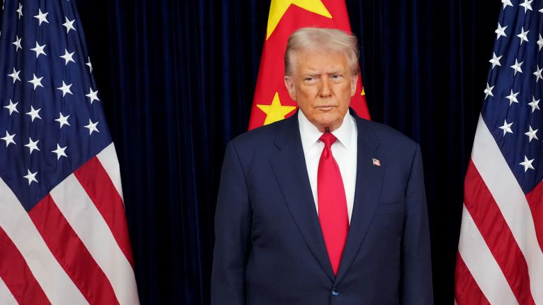 US President Donald Trump prepares to greet Chinese President Xi Jinping ahead of a bilateral meeting at Gimhae Air Base in Busan, South Korea, on October 30.