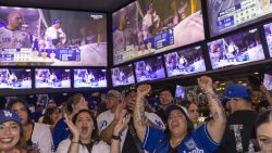 LOS ANGELES, CALIFORNIA - NOVEMBER 1: L.A. Dodgers fans including Jessica Ramirez and Sharon Monterroso celebrate Game 7 Of The World Series Against The Toronto Blue Jays at Tom's Watch Bar on November 1, 2025 in Los Angeles, California. (Photo by Jill Connelly/Getty Images)