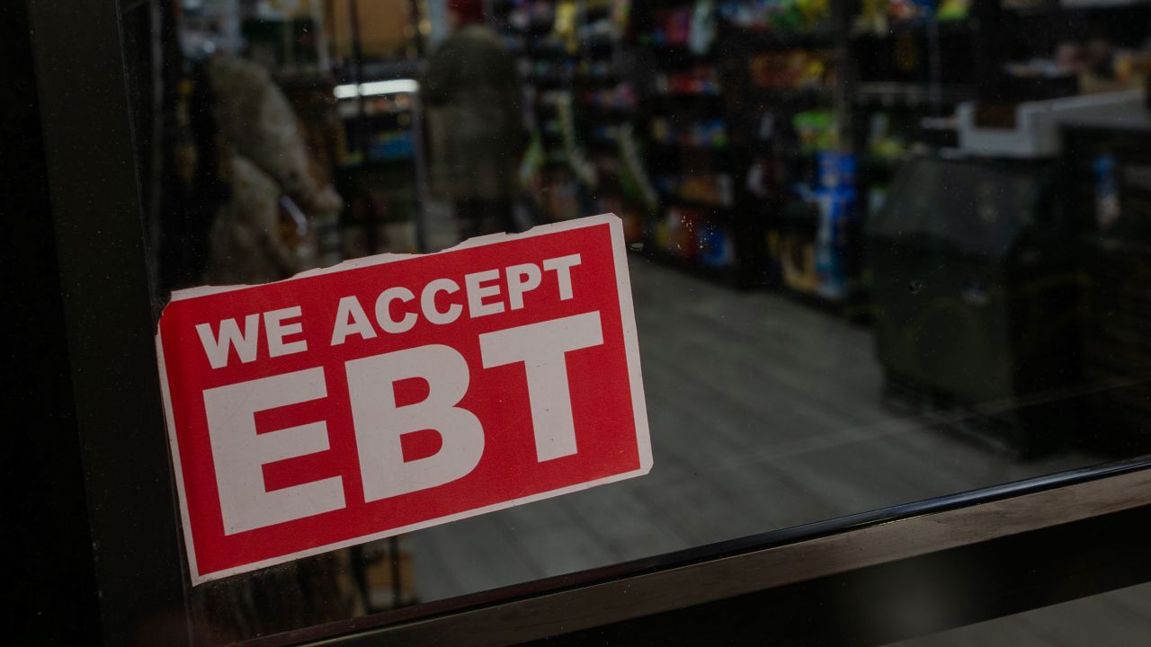 NEW YORK, NY - OCTOBER 30: A store displays a sign accepting Electronic Benefits Transfer (EBT) cards for Supplemental Nutrition Assistance Program (SNAP) purchases for groceries on October 30, 2025 in New York City. Approximately 42 million Americans rely on food stamps that are deposited monthly onto their EBT cards. On November 1st, that assistance is set to end amid the ongoing U.S. government shutdown, potentially leaving households desperate to find ways to put food on the table. (Photo by Spencer Platt/Getty Images)