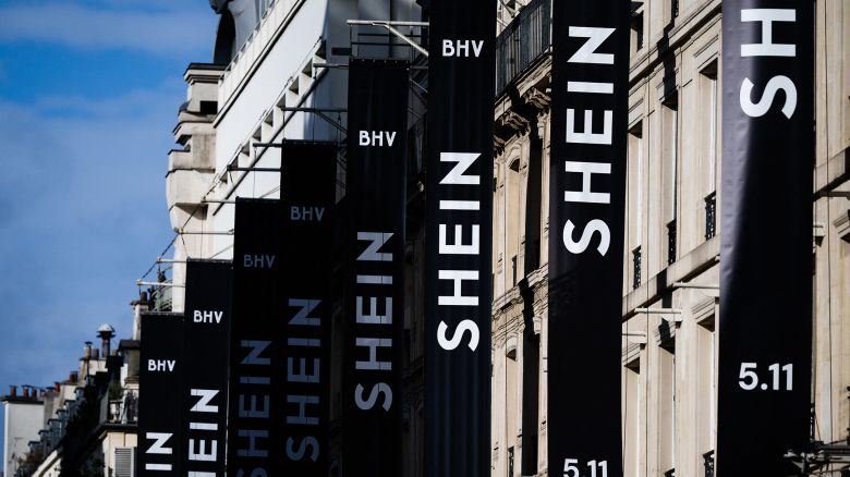 This photograph shows the logo of Asian e-commerce giant Shein on the facade of the Bazar de l'Hotel de Ville (BHV) department store in Paris on November 3, 2025, just days before it opens its first physical store at BHV in Paris.