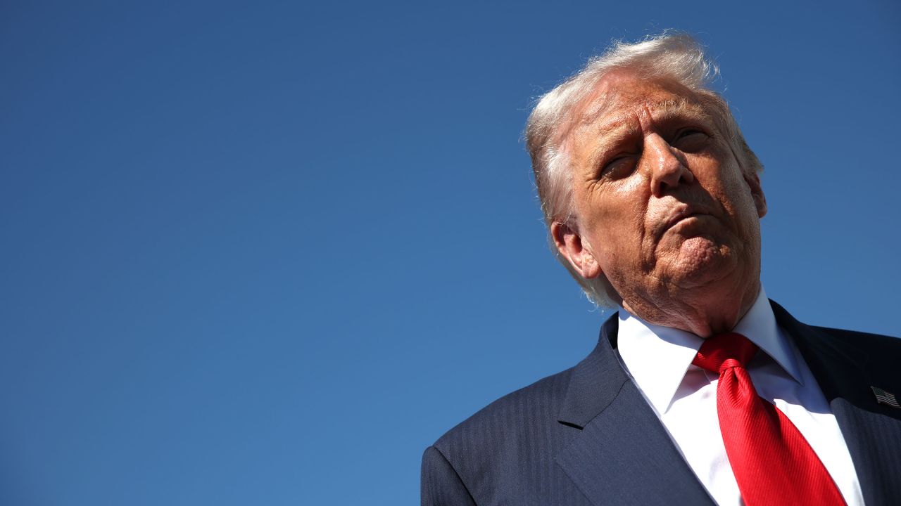 WEST PALM BEACH, FLORIDA - OCTOBER 31: US President Donald Trump speaks to reporters as he arrives at Palm Beach International Airport on October 31, 2025 in West Palm Beach, Florida. Trump is spending the weekend at his Mar-A-Lago estate in Palm Beach, Florida. (Photo by Samuel Corum/Getty Images)