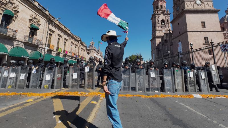 Murder of outspoken anti-crime mayor spurs violent protests in Mexican state