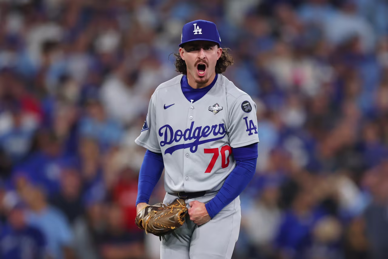 Dodgers reliever Justin Wrobleski reacts after getting a strikeout to end the seventh.