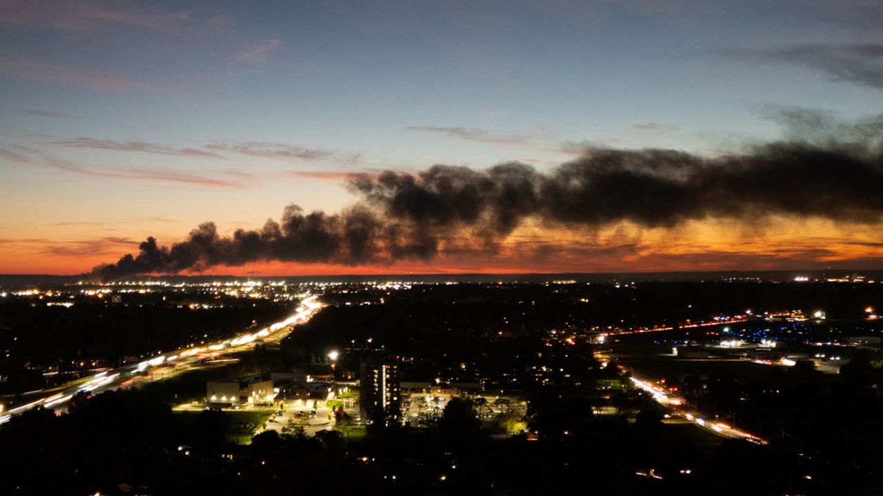 Smoke rises from the site of a UPS cargo plane crash near the UPS Worldport at Louisville Muhammad Ali International Airport in Louisville, Kentucky, on November 4, 2025. The death toll from a UPS cargo plane crashing in Louisville has risen to nine with more fatalities feared, Kentucky's governor said November 5, as search efforts continued and the airport resumed flights. The McDonnell Douglas MD-11 departing for Hawaii crashed at around 5:15 pm (2215 GMT) Tuesday, November 4, shortly after taking off from Louisville Muhammad Ali International Airport.
