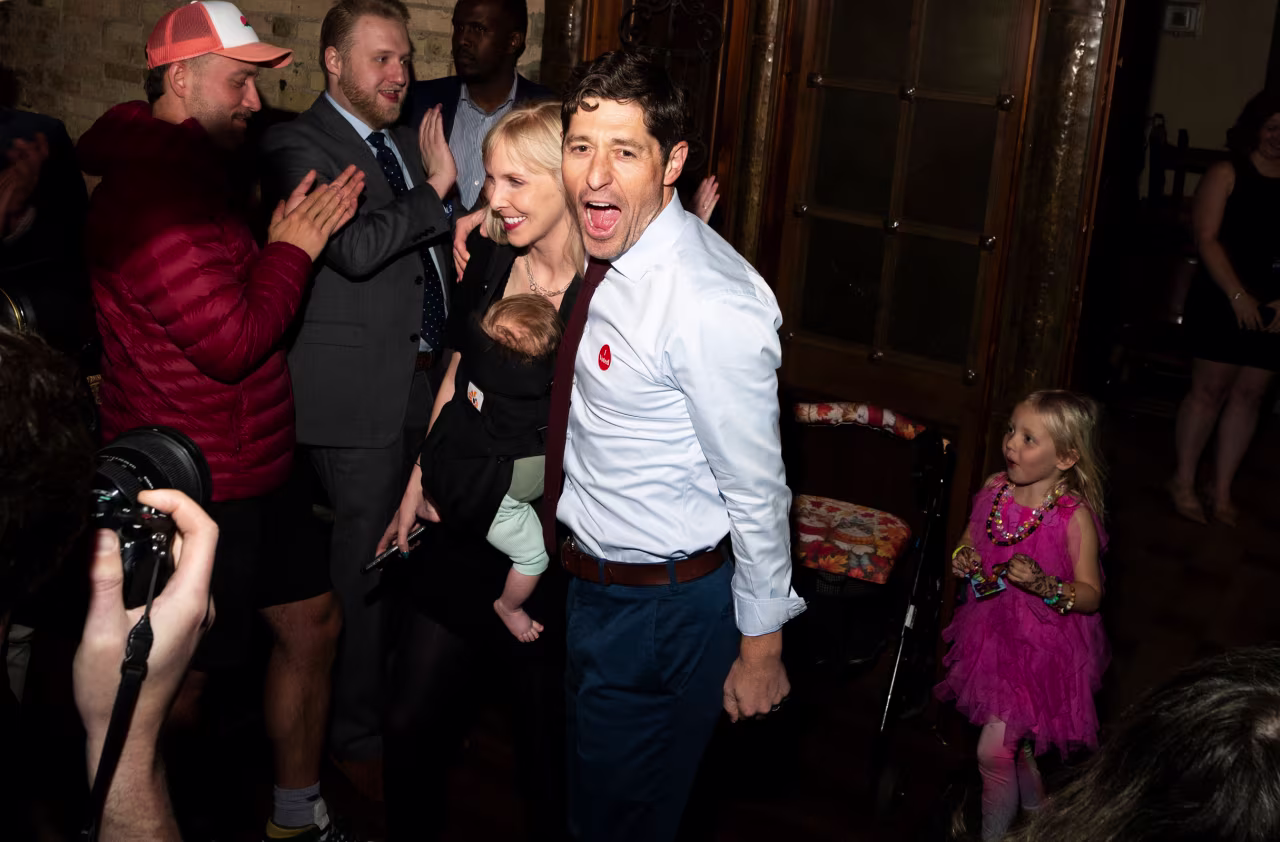 Minneapolis Mayor Jacob Frey arrives with his wife Sarah Clarke at an election night party in Minneapolis, Minnesota, on Tuesday.