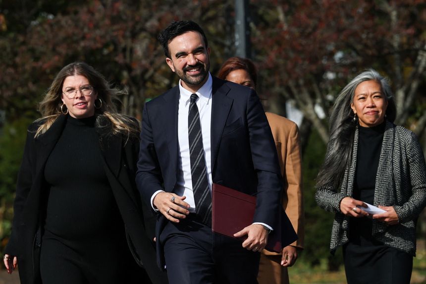 New York City mayor-elect Zohran Mamdani arrives for a a news conference alongside members of his mayoral transition team in New York City on November 5.