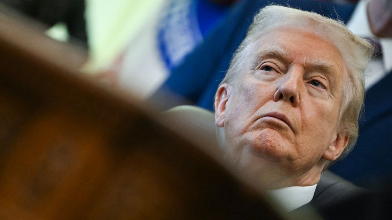 US President Donald Trump listens during an event about weight-loss drugs in the Oval Office of the White House in Washington DC,  on November 6, 2025.