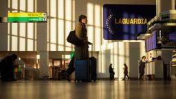Travelers in Terminal B at LaGuardia Airport (LGA) in the Queens borough of New York, on November 7, 2025.