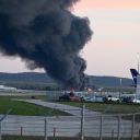 LOUISVILLE, KENTUCKY - NOVEMBER 04: Fire and smoke mark where a UPS cargo plane crashed near Louisville Muhammad Ali International Airport on November 04, 2025 in Louisville, Kentucky. The fully fueled plane crashed shortly after takeoff with a shelter-in-place order issued for within 5 miles of the airport. (Photo by Stephen Cohen/Getty Images)