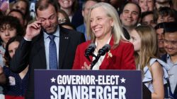 RICHMOND, VIRGINIA - NOVEMBER 04: Adam Spanberger (L), husband of Virginia Democratic gubernatorial candidate, former Rep. Abigail Spanberger becomes emotional as she delivers remarks during her election night watch party at the Greater Richmond Convention Center on November 04, 2025 in Richmond, Virginia. Spanberger defeated Republican gubernatorial candidate Lieutenant Gov. Winsome Earle-Sears to become the first female governor in the commonwealth’s history in an election that was seen as a national political bellwether leading into the midterms. (Photo by Alex Wong/Getty Images)