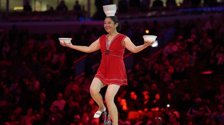 CHICAGO, ILLINOIS - NOVEMBER 04: Acrobat Red Panda performs at halftime between the Chicago Bulls and the Philadelphia 76ers at the United Center on November 04, 2025 in Chicago, Illinois. NOTE TO USER: User expressly acknowledges and agrees that, by downloading and or using this photograph, User is consenting to the terms and conditions of the Getty Images License Agreement. (Photo by Michael Reaves/Getty Images)