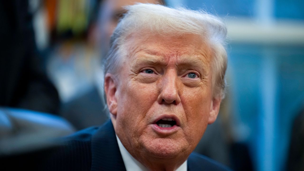 US President Donald Trump during a swearing-in ceremony in the Oval Office of the White House in Washington, DC, November 10, 2025.