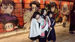 Demon Slayer Kimetsu no Yaiba - The Movie: Infinity Castle China Premiere Ceremony, fan cosplay takes a photo in front of the poster wall as an anime character, Shanghai, China on November 10, 2025.