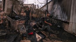 Palestinians inspect parts of a burnt house after an Israeli settlers attack in the village of Beit Lid, east of Tulkarm in the occupied West Bank on November 11, 2025. Violence in the West Bank has soared since the war in Gaza broke out in October 2023. (Photo by JAAFAR ASHTIYEH / AFP) (Photo by JAAFAR ASHTIYEH/AFP via Getty Images)          
