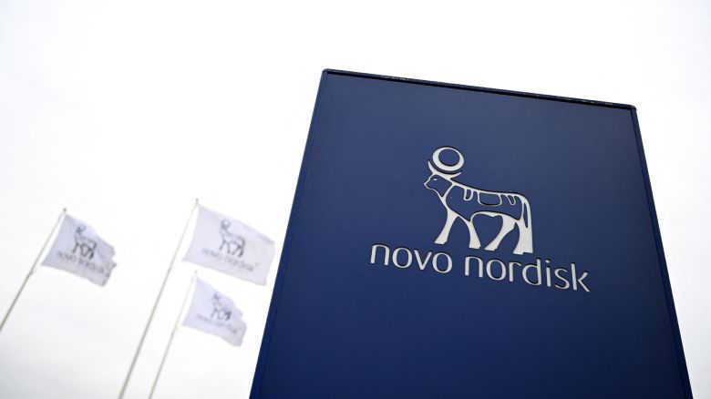 This photograph taken on November 12, 2025 shows a sign bearing the logo of Novo Nordisk next to the company's factory in Hillerod. On November 14, 2025 the extraordinary general meeting will take place to renew more than half of the board of directors, including the chair.