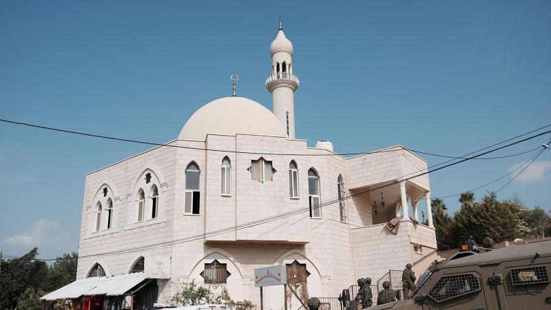 Israeli settlers torch mosque and spray graffiti in latest West Bank attack