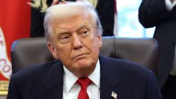 President Donald Trump looks on during the swearing-in ceremony of US Ambassador to India Sergio Gor in the Oval Office of the White House on November 10, 2025.