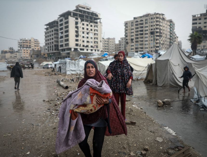 Palestinians whose homes were destroyed in two years of Israeli attacks were in dire straits in Gaza City on Friday after heavy rains flooded their makeshift tents.