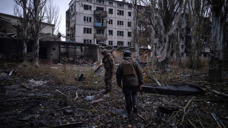 This handout photograph, taken on November 12, 2025, and released on November 15, 2025 by the press service of the 93rd Kholodnyi Yar Separate Mechanized Brigade of the Ukrainian Ground Forces shows Ukrainian servicemen checking the area next to destroyed buildings in the frontline town of Kostyantynivka, Donetsk region, amid the Russian invasion of Ukraine.