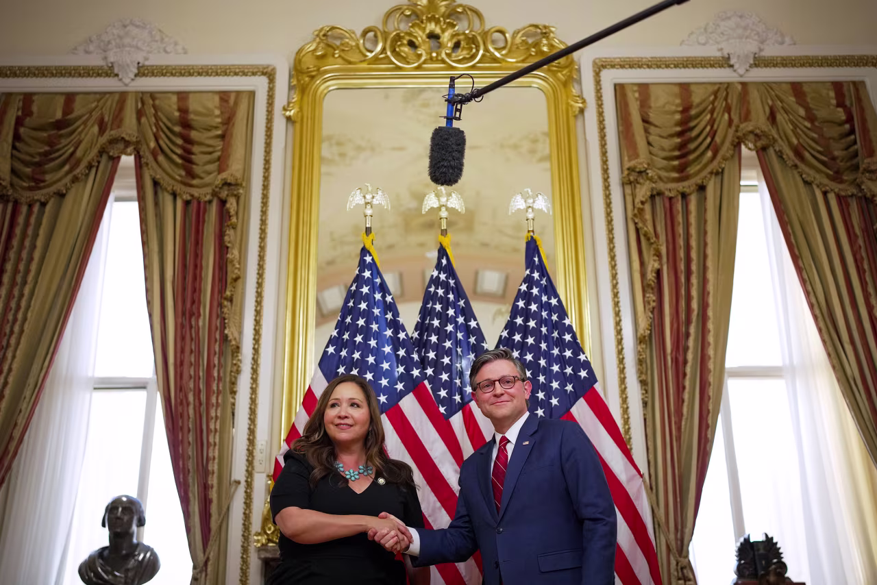 Rep. Adelita Grijalva poses for a photo with Speaker of the House Mike Johnson during a ceremonial swearing-in at the US Capitol on Wednesday.