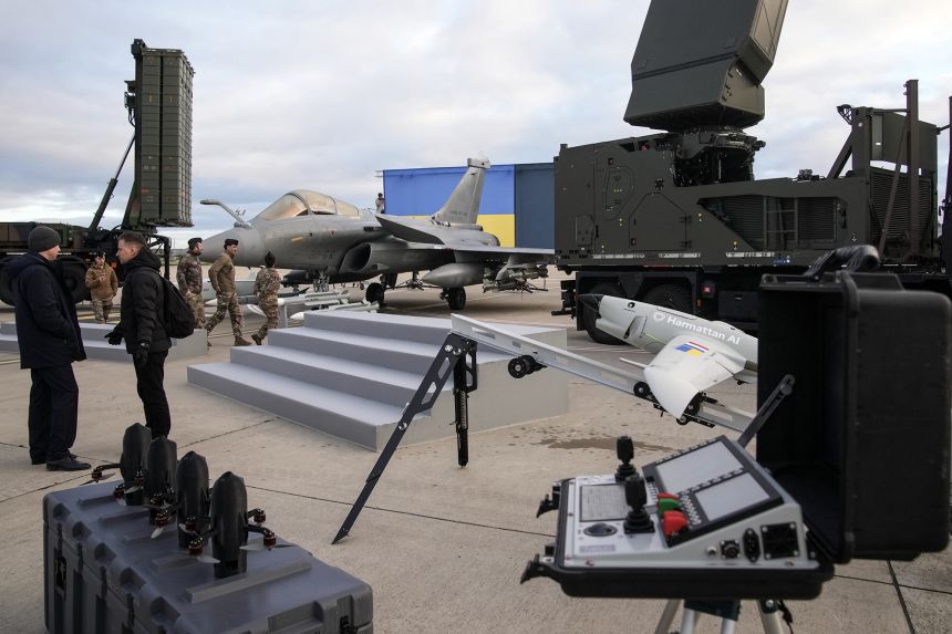 A Rafale jet fighter, drones and ammunition on display at the Villacoublay air base, in Velizy-Villacoublay, France, before the arrival of Ukraine's President Volodymyr Zelensky on Monday.