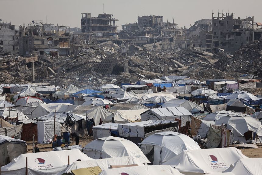 Displaced Palestinians live in makeshift tents in Gaza City's Zeitoun district on Monday.
