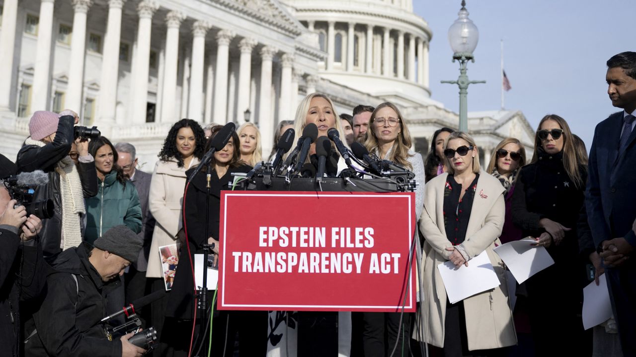 Rep. Marjorie Taylor Greene (R-GA) (C) speaks during a news conference on the Epstein Files Transparency Act at the US Capitol in Washington, DC, on November 18, 2025. US lawmakers are expected to vote Tuesday for the release of government records on sex offender Jeffrey Epstein, in defiance of President Donald Trump's attempts to keep a lid on one of the country's most notorious scandals. (Photo by DANIEL HEUER / AFP) (Photo by DANIEL HEUER/AFP via Getty Images)          
