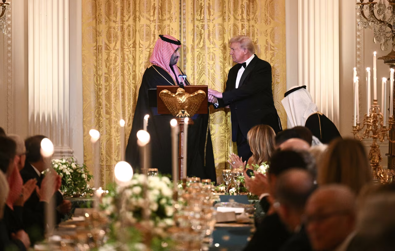 President Donald Trump shakes hands Saudi Crown Prince Mohammed bin Salman during a dinner in the East Room of the White House in Washington, DC, on Tuesday, November 18.