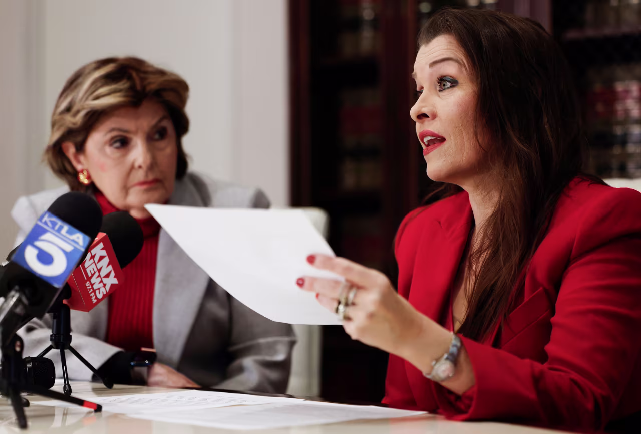 Alicia Arden, right, speaks next to attorney Gloria Allred during a press conference on November 17 in Los Angeles.