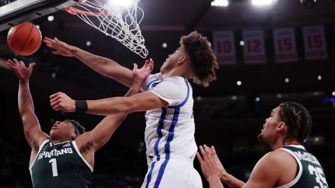 Jeremy Fears Jr. #1 of the Michigan State Spartans goes to the basket as Jasper Johnson #2 of the Kentucky Wildcats defends during the first half in the 2025 State Farm Champions Classic at Madison Square Garden on November 18, 2025 in New York City.