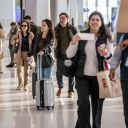 Travelers at Newark Liberty International Airport (EWR) in Newark, New Jersey, US, on Monday, Nov. 24, 2025. Fewer US travelers are due to fly over the upcoming Thanksgiving holidays, with Christmas demand also looking shaky, after a record US government shutdown and concern about the economy weighed on would-be flyers. Photographer: Victor J. Blue/Bloomberg via Getty Images