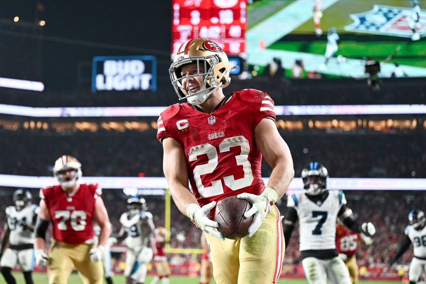 Niners running back Christian McCaffrey scores a touchdown in the third quarter against the Carolina Panthers at Levi's Stadium on Monday.
