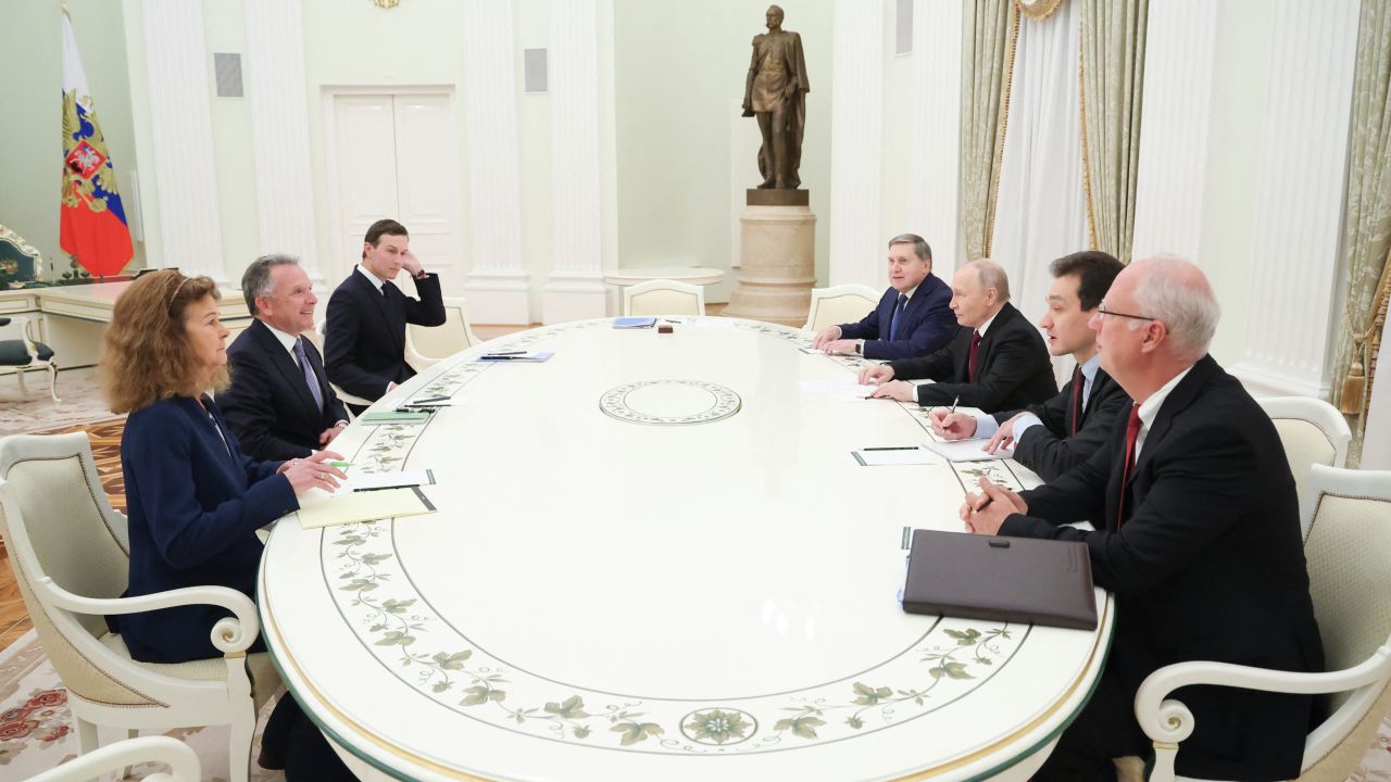 In this pool photograph distributed by the Russian state agency Sputnik, Russia's President Vladimir Putin, accompanied by Kremlin economic envoy Kirill Dmitriev and Kremlin aide Yuri Ushakov, meets with US special envoy Steve Witkoff and US President Donald Trump's son-in-law Jared Kushner at the Kremlin in Moscow on December 2, 2025.