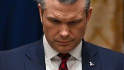 Secretary of Defense Pete Hegseth listens as President Donald Trump speaks during a Cabinet meeting at the White House, on Tuesday, December 2, 2025.