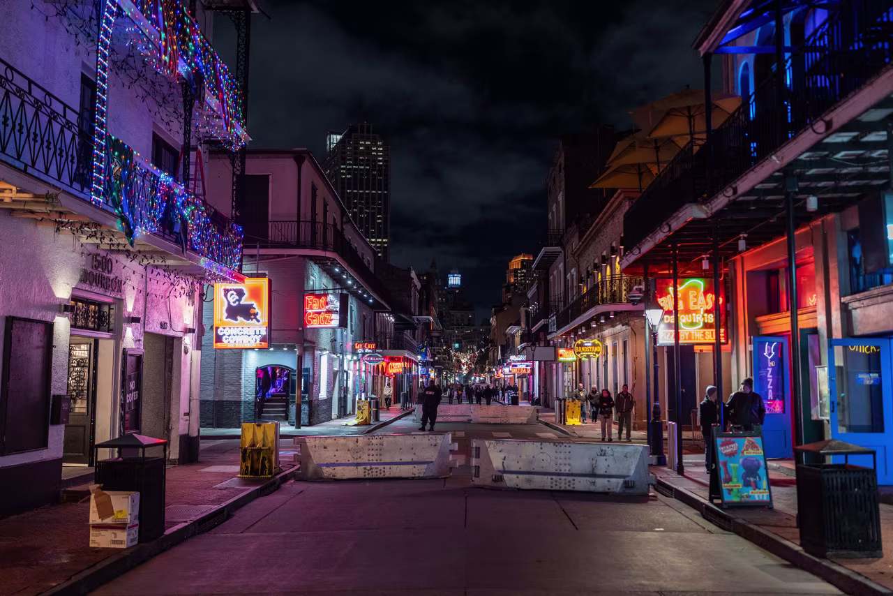 Concrete barriers block vehicle access to the pedestrian area of Bourbon Street in New Orleans on December 2.