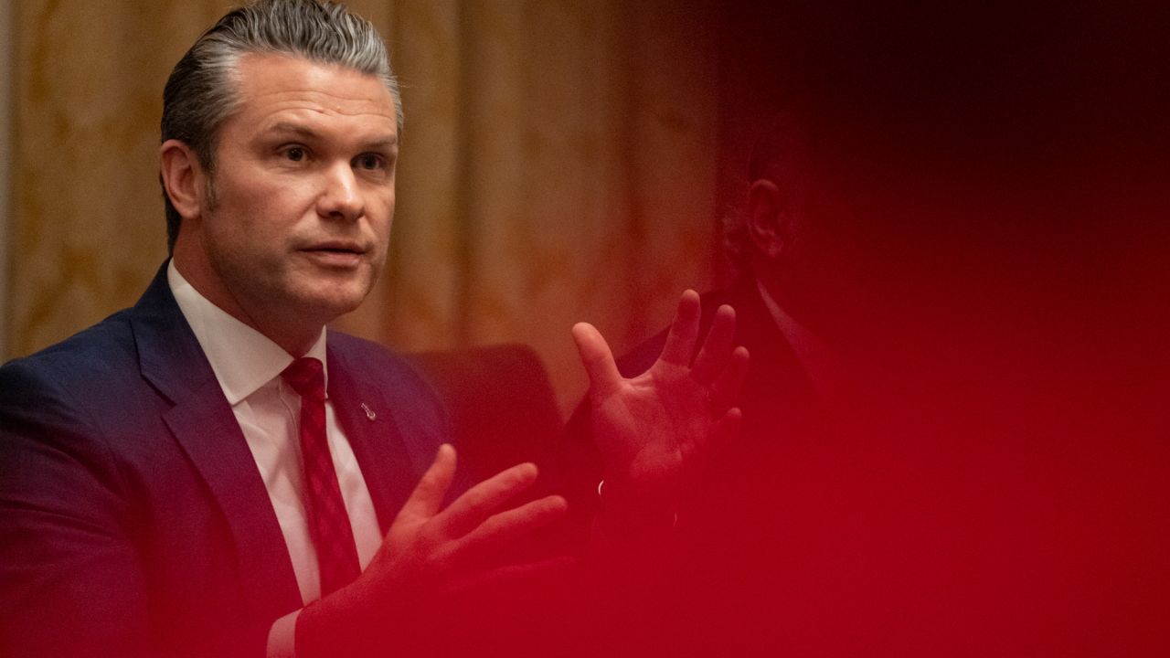 Defense Secretary Pete Hegseth speaks in front of President Donald Trump during a cabinet meeting at the White House in Washington, DC on December 2, 2025.