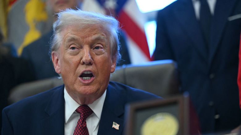 President Donald Trump makes an announcement from the Oval Office of the White House in Washington, DC on December 3, 2025. President Trump announced weaker fuel efficiency standards for the country, as part of his agenda to lower the price of gasoline-powered cars.